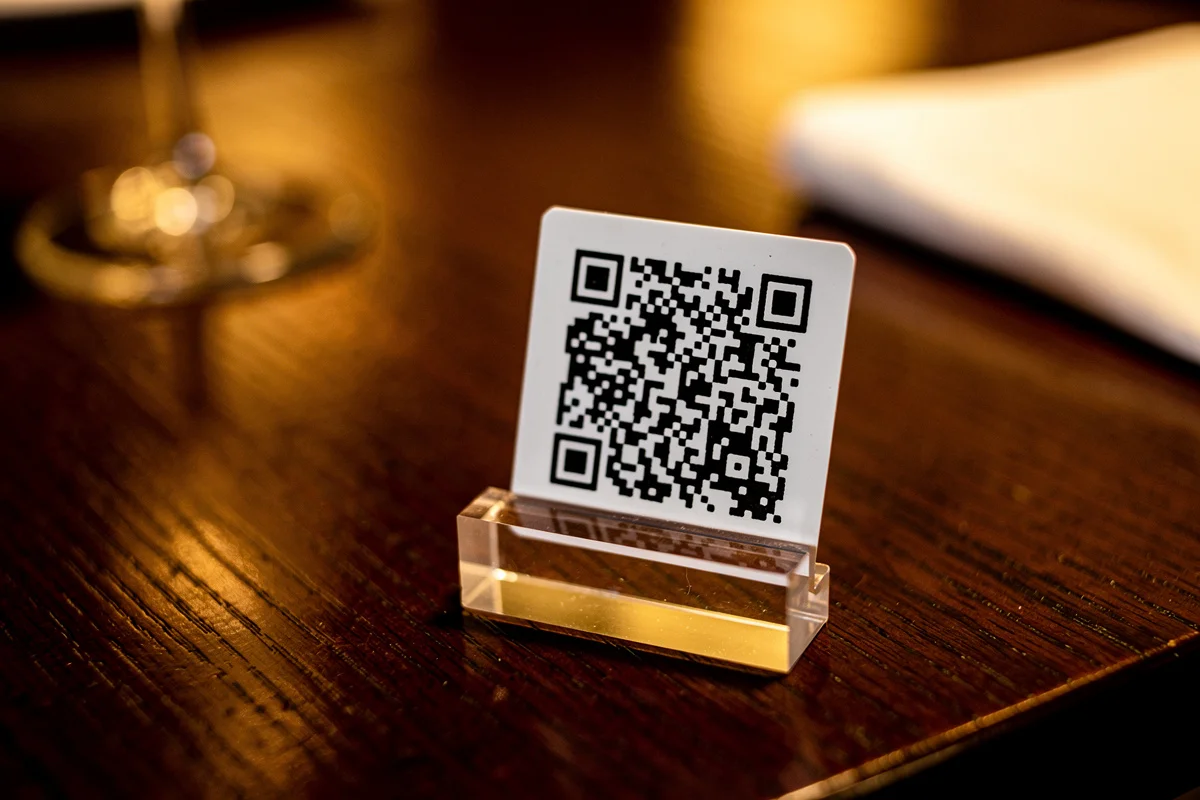 QR code in acrylic stand on restaurant table